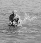 Pablo Picasso and Claude Picasso. Golfe-Juan 1954. - Photo by Edward Quinn