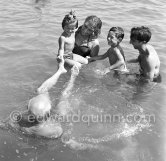 Pablo Picasso with his children Claude Picasso, Paloma Picasso and Maya Picasso and Javier Vilató at the beach. Golfe-Juan 1954. - Photo by Edward Quinn