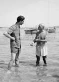Pablo Picasso at the beach with Edward Quinn. Golfe-Juan 1954. Photographer unknown. Edward Quinn Archive. - Photo by Edward Quinn