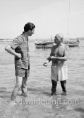 Pablo Picasso at the beach with Edward Quinn. Golfe-Juan 1954. Photographer unknown. Edward Quinn Archive. - Photo by Edward Quinn