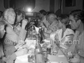 Manuel Angeles Ortiz, Francisco Reina "El Minuni", Paulo Picasso, Pablo Picasso, Maya Picasso and Eugenio Carmona. Dinner in a restaurant at Golfe-Juan or Juan-les-Pins 1954. - Photo by Edward Quinn