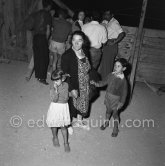 Claude Picasso and Paloma Picasso with her nanny Madame Michel (?). First Corrida at Vallauris 1954. - Photo by Edward Quinn
