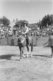Françoise Gilot, opening the corrida of Vallauris 1.8.1954. - Photo by Edward Quinn