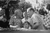 Pablo Picasso interviewed for Radio Monte Carlo. Singer Yolanda and Claude Picasso. First Corrida of Vallauris 1954. - Photo by Edward Quinn