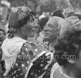 Party after the bullfight: Pablo Picasso dancing with an unknown man disguised as a woman. Vallauris 1954. - Photo by Edward Quinn