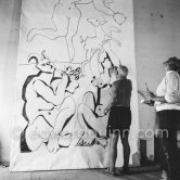 Pablo Picasso working on a bucolic pastoral scene on drawing paper which was to serve as background for the film "Le mystère Picasso". Maya Picasso on the right. Nice, Studios de la Victorine 1955. - Photo by Edward Quinn