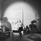 Picasso working on a bucolic pastoral scene on drawing paper which was to serve as background for the film "Le mystère Picasso" by Henri-Georges Clouzot. Nice, Studios de la Victorine 1955. - Photo by Edward Quinn