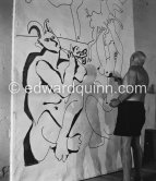 Picasso working on a bucolic pastoral scene on drawing paper which was to serve as background for the film "Le mystère Picasso" by Henri-Georges Clouzot. Nice, Studios de la Victorine 1955. - Photo by Edward Quinn