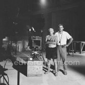 Pablo Picasso and cameraman Claude Picasso Renoir. During filming of "Le mystère Picasso". Nice, Studios de la Victorine 1955. - Photo by Edward Quinn