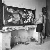 Pablo Picasso portrays a stage in the bullfight when the bullfighter is caught by the horns of the bull. During filming of "Le mystère Picasso". Nice, Studios de la Victorine, 1955. - Photo by Edward Quinn