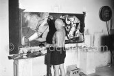 Pablo Picasso portrays a stage in the bullfight when the bullfighter is caught by the horns of the bull. During filming of "Le mystère Picasso". Nice, Studios de la Victorine, 1955. - Photo by Edward Quinn