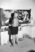 Pablo Picasso portrays a stage in the bullfight when the bullfighter is caught by the horns of the bull. During filming of "Le mystère Picasso". Nice, Studios de la Victorine, 1955. - Photo by Edward Quinn