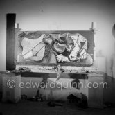 Pablo Picasso portrays a stage in the bullfight when the bullfighter is caught by the horns of the bull. During filming of "Le mystère Picasso". Nice, Studios de la Victorine, 1955. - Photo by Edward Quinn