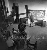 Pablo Picasso portrays a stage in the bullfight when the bullfighter is caught by the horns of the bull. During filming of "Le mystère Picasso". Nice, Studios de la Victorine, 1955. - Photo by Edward Quinn