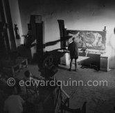 Pablo Picasso portrays a stage in the bullfight when the bullfighter is caught by the horns of the bull. During filming of "Le mystère Picasso". Nice, Studios de la Victorine, 1955. - Photo by Edward Quinn