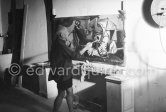 Pablo Picasso portrays a stage in the bullfight when the bullfighter is caught by the horns of the bull. During filming of "Le mystère Picasso". Nice, Studios de la Victorine, 1955. - Photo by Edward Quinn