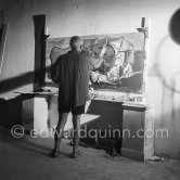 Pablo Picasso portrays a stage in the bullfight when the bullfighter is caught by the horns of the bull. During filming of "Le mystère Picasso". Nice, Studios de la Victorine, 1955. - Photo by Edward Quinn