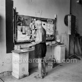 Pablo Picasso painting "La plage à la Garoupe I" for the film "Le mystère Picasso". Nice, Studios de la Victorine, 1955. - Photo by Edward Quinn