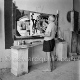 Pablo Picasso painting "La plage à la Garoupe I" for the film "Le mystère Picasso". Nice, Studios de la Victorine, 1955. - Photo by Edward Quinn