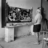 Pablo Picasso painting "La plage à la Garoupe I" for the film "Le mystère Picasso". Nice, Studios de la Victorine, 1955. - Photo by Edward Quinn