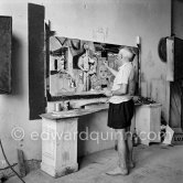 Pablo Picasso painting "La plage à la Garoupe I" for the film "Le mystère Picasso". Nice, Studios de la Victorine, 1955. - Photo by Edward Quinn