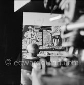 Pablo Picasso viewing his painting "La plage à la Garoupe I" for the film "Le mystère Picasso". Nice, Studios de la Victorine, 1955. - Photo by Edward Quinn