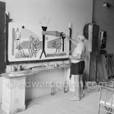 Pablo Picasso painting "La plage à la Garoupe II" for the film "Le mystère Picasso". Nice, Studios de la Victorine, 1955. - Photo by Edward Quinn