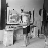 Pablo Picasso painting "La plage à la Garoupe II" for the film "Le mystère Picasso". Nice, Studios de la Victorine, 1955. - Photo by Edward Quinn