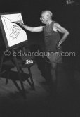 Pablo Picasso at work during filming of "Le mystère Picasso". Nice, Studios de la Victorine, 1955. - Photo by Edward Quinn