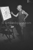 Pablo Picasso at work during filming of "Le mystère Picasso". Nice, Studios de la Victorine, 1955. - Photo by Edward Quinn