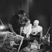 The background music of the Clouzot/Pablo Picasso film is by one of their old friends Georges Auric who has become very well-known for his music from "Moulin rouge". Here he is seen with Clouzot and Pablo Picasso on the film set of "Le mystère Picasso", Nice, Studios de la Victorine 1955. - Photo by Edward Quinn