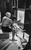 Something begun as a bouquet has become first a fish, then a cock, and finally the head of a faun. Pablo Picasso at work during filming of "Le mystère Picasso". Nice, Studios de la Victorine, 1955. - Photo by Edward Quinn