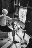 Something begun as a bouquet has become first a fish, then a cock, and finally the head of a faun. Pablo Picasso at work during filming of "Le mystère Picasso". Nice, Studios de la Victorine, 1955. - Photo by Edward Quinn