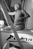 Pablo Picasso working on "La Célestine" where he had to do his signature backwards. "Le mystère Picasso", Nice, Studios de la Victorine 1955. - Photo by Edward Quinn