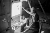 Pablo Picasso working on "La Célestine" where he had to do his signature backwards. "Le mystère Picasso", Nice, Studios de la Victorine 1955. - Photo by Edward Quinn