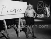 Pablo Picasso at work. Large signature third version (used in the film). "Le mystère Picasso", Nice, Studios de la Victorine 1955. - Photo by Edward Quinn