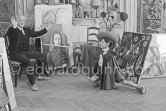 Pablo Picasso with Claude Picasso in "swashbuckler" ("cap et épée") dress. La Californie, Cannes 1955. - Photo by Edward Quinn