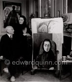 Pablo Picasso and Jacqueline with the painting "Portrait de Jacqueline au rocking-chair et à la mantille noire". La Californie, Cannes 1955. (Digitized from Vintage Print, original negative missing) - Photo by Edward Quinn