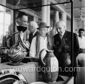Pablo Picasso at the "Exposition Internationale Céramique". With Manuel Gonzalez Marti, director of the Museo de Bellas Artes de Valencia. Cannes 1955. - Photo by Edward Quinn