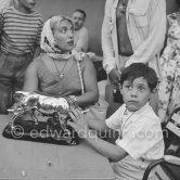 Local Corrida. Maya Picasso and Claude Picasso with a bull sculpture, a present from the bullfighters ("A notre camarade Pablo Picasso, Section Vallauris, Corrida 1955."). Vallauris 1955. - Photo by Edward Quinn