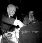 Pablo Picasso and Jacqueline attending the showing of "Le mystère Picasso". Cannes Film Festival 1956. - Photo by Edward Quinn