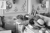 In Pablo Picasso’s studio at La Californie, a corner was reserved for a great number of hats and masks given to him by friends and visitors. La Californie, Cannes 1956. - Photo by Edward Quinn