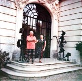 Pablo Picasso and Jacqueline at the entrance of La Californie. Jacqueline is wearing a dress with printed motifs of a Pablo Picasso work. La Californie, Cannes 1956. - Photo by Edward Quinn