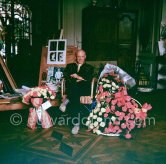 Pablo Picasso on the day of his 75th birthday with flowers he received, some with the Spanish colors. La Californie, Cannes 1956. - Photo by Edward Quinn