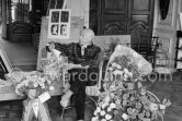 Pablo Picasso on the day of his 75th birthday with flowers he received. La Californie, Cannes 1956. - Photo by Edward Quinn
