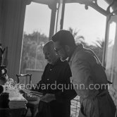 Pablo Picasso examining tiles. With Jean Ramié. La Californie, Cannes 1956. - Photo by Edward Quinn