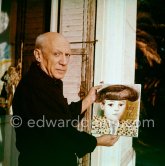 Pablo Picasso with "Claude Picasso en torero". La Californie, Cannes 1956. see also b/w Pic560166 - Photo by Edward Quinn