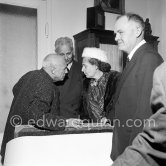 Picasso at a private viewing of his book illustrations in the Matarasso gallery in Nice. With Louis Aragon, his wife, famous lady communist Elsa Triolet and Maurice Thorez. "Picasso. Un Demi-Siècle de Livres Illustrés". Galerie H. Matarasso. December 21 - January 31.Nice 1956. - Photo by Edward Quinn