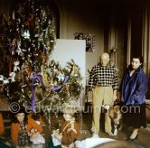 Pablo Picasso at Christmas with Esmeralda, the goat he received from Jacqueline. Jacqueline Roque, Paloma Picasso, Catherine Hutin. La Californie, Cannes 1956. - Photo by Edward Quinn
