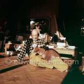 Pablo Picasso with the goat Esmeralda at Christmas 1956. She was a Christmas present from Jacqueline. La Californie, Cannes 1956. - Photo by Edward Quinn